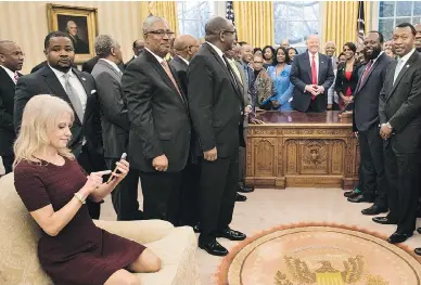  ?? BRENDAN SMIALOWSKI / AFP / GETTY IMAGES ?? Kellyanne Conway, aide to U.S. President Donald Trump, is getting flak for a photo of her on a couch in the Oval Office with her shoes on. She had just taken a photo of Trump with leaders of historical­ly black colleges.