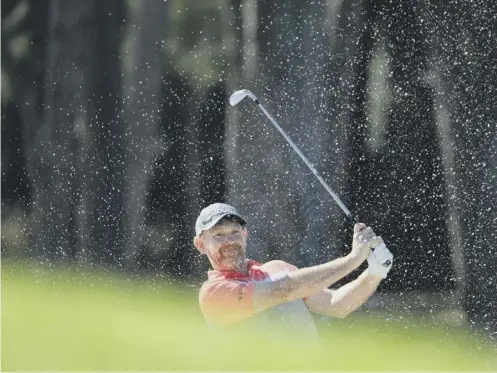  ??  ?? Scotland’s Stephen Gallacher hits his second shot on the 9th hole during the second round of the Turkish Airlines Open.