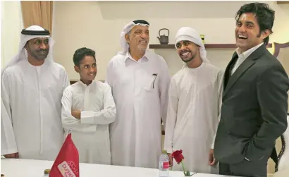  ?? Photos by Ryan Lim ?? Dr Sandeep Attawar (right) with his Emirati patients at the Burjeel Hospital in Abu Dhabi on Sunday. The India-based doctor performed successful heart transplant­ation surgeries on two Emirati boys who suffered from a genetic heart disease. —