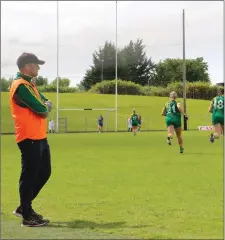  ??  ?? Meath mentor Paul Garrigan watches on from the sidelines.