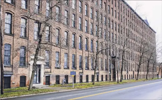  ?? Photos by Paul Buckowski / Times Union ?? There are plans to turn the Standard Manufactur­ing building in Troy into 151 apartment units with commercial space on the first floor.