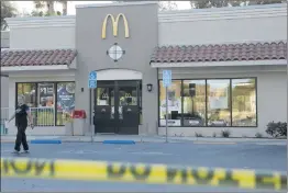 ?? Nikolas Samuels/The Signal ?? A woman leaves the McDonald’s parking lot in Castaic after discoverin­g it was closed on Wednesday. The restaurant was closed due to a violation of the California Health and Safety Code and/or the Los Angeles County Code.