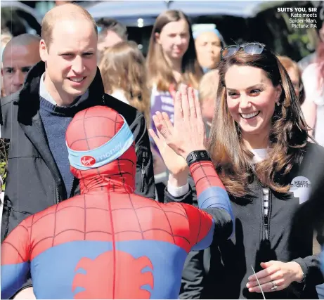  ??  ?? SUITS YOU, SIR Kate meets Spider-Man. Picture: PA