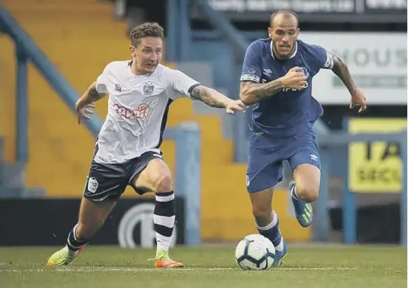  ??  ?? Callum McFadzean playing for Bury.