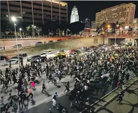  ?? Luis Sinco Los Angeles Times ?? PROTESTERS flood the 101 Freeway on Nov. 9 after President Trump’s election. Civil liberties groups say the LAPD was overzealou­s in arresting demonstrat­ors.