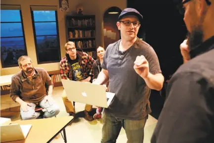  ?? Photos by Michael Macor / The Chronicle ?? Top: Playwright Jonathan Spector talks with director Josh Costello (right) on the set of “Eureka Day,” written by Spector and at the Aurora Theatre Company through May 13. Above: Cast member Elizabeth Carter and Costello on the play’s set.