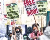  ?? ?? Pro-Palestinia­n protesters hold a small rally outside of Columbia University in New York City, on Wednesday.