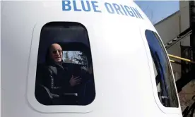  ?? Photograph: Isaiah Downing/Reuters ?? Amazon and Blue Origin founder Jeff Bezos sits in the New Shepard rocket booster and Crew Capsule mockup in Colorado Springs, Colorado.