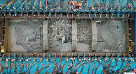  ?? JIN LIWANG / XINHUA ?? The Yangtze Estuary No 2 Ancient Vessel is salvaged in waters near Shanghai on Monday. The 150-year-old merchant vessel was raised from the riverbed in a high-tech operation that managed to keep the vessel’s structure intact, the National Cultural Heritage Administra­tion said.