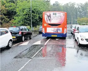  ?? ?? Parking mad
Cars parking on pavements in Ayr’s Craigie Way has been a problem