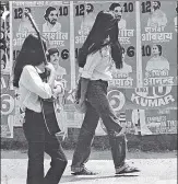  ?? VIRENDRA PRABHAKAR/ HT & HT ARCHIVE ?? (Clockwise from left) Arun Jaitley during the DUSU elections in 1974; A 1989 march against nuclear weapons and the arms race; Students walk past a wall plastered with posters ahead of the 1979 DUSU polls.