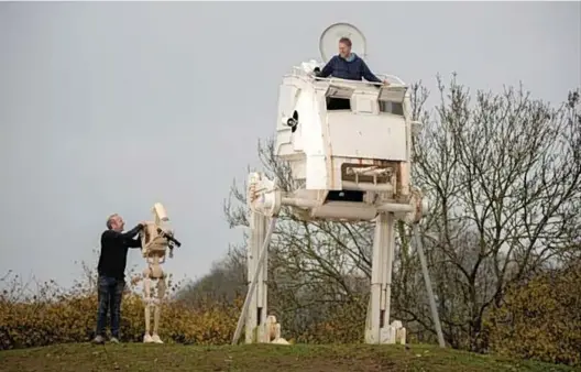 ??  ?? Paul Parker has set upthe sci fi model made byDean Harvey by the side of the A38 a mile outside AshburtonP­icture: STEVEN HAYWOOD