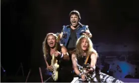  ?? Photograph: Mick Hutson/Redferns ?? Monsters of rock … (from left) Dave Murray, Bruce Dickinson and Janick Gers at Rock in Rio in 2001.