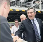  ??  ?? ALL REVVED UP Gordon Brown meets workers at Ellesmere Port plant in 2009