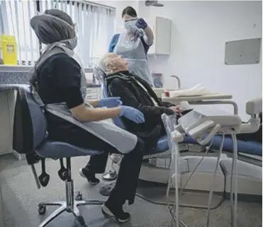  ??  ?? FILLING IN: More than 10,000 dental surgeries re-opened across the UK this week