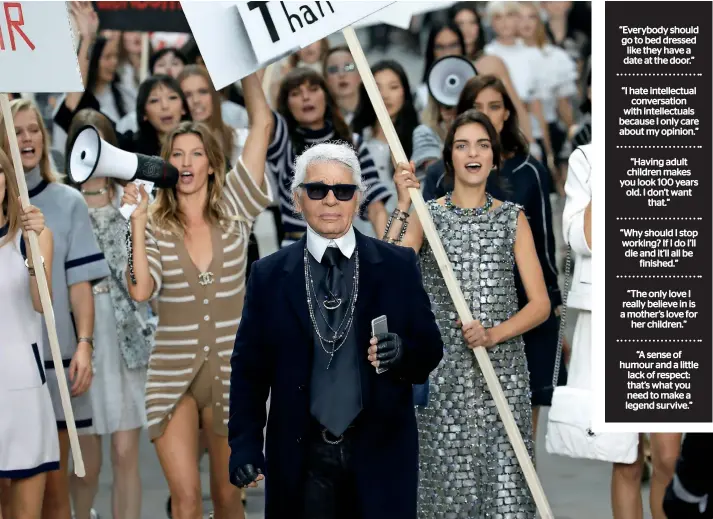  ??  ?? Karl Lagerfeld appears with models at the end of his Spring/summer 2015 women’s ready-to-wear collection for Chanel during Paris Fashion Week September 30, 2014