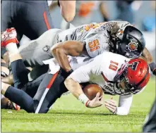  ?? [SARAH PHIPPS/THE OKLAHOMAN] ?? Oklahoma State defensive end Mike Scott (91) had three sacks last season, including two against Texas Tech.