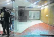  ?? SOURCED ?? Police inspect the interiors of Priyagold Biscuits unit in Greater Noida, damaged by some workers on Thursday.