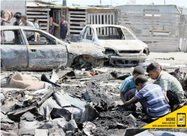  ?? | SISONKE MLAMLA ?? BLIKKIESDO­RP after a fire destroyed at least eight shacks.