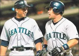  ?? Linda Kaye Associated Press ?? ALEX RODRIGUEZ, left, admired former Seattle Mariners teammate Edgar Martinez, who will be inducted into the Baseball Hall of Fame this weekend.