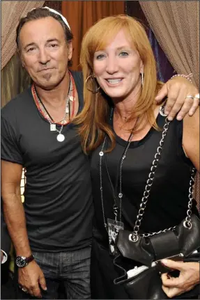  ??  ?? Striking a pose: Bruce Springstee­n with his wife Patti Scialfa