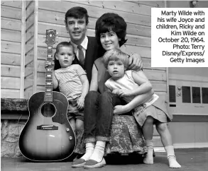  ??  ?? Marty Wilde with his wife Joyce and children, Ricky and Kim Wilde on October 20, 1964. Photo: Terry Disney/express/ Getty Images