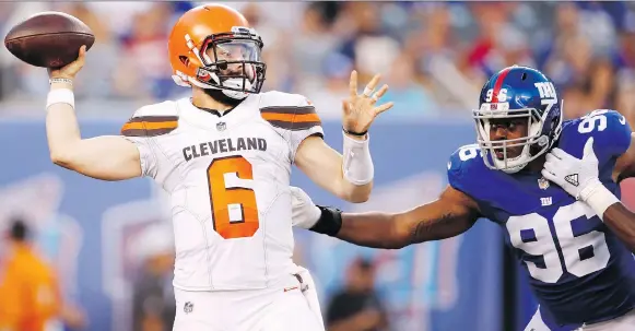  ?? THE ASSOCIATED PRESS ?? Cleveland Browns quarterbac­k Baker Mayfield looked good against Kareem Martin and the New York Giants last week, but he has yet to face first-string defenders.