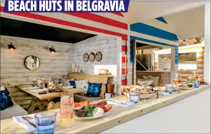  ??  ?? BEACH HUTS IN BELGRAVIA
WISH YOU WERE HERE: Knightsbri­dge’s The Berkeley has erected dining areas inspired by seaside resort beach huts