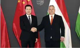  ?? Photograph: Xinhua/Rex/Shuttersto­ck ?? The Hungarian prime minister, Viktor Orbán (right), with China’s minister of public security, Wang Xiaohong, in Budapest on Friday.