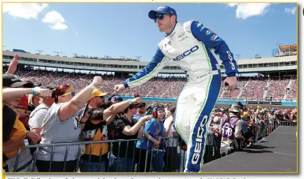  ?? (AP Photo/ralph Freso, File) ?? FILE - Ty Dillon during fist bumps with fans during driver introducti­ons prior to the NASCAR Cup Series auto race at Phoenix Raceway in Avondale, Ariz., in this Sunday, March 8, 2020, file photo. Ty Dillon landed a Daytona 500 ride with Gaunt Brothers Racing in a pairing of a driver and team both trying to rebuild in 2021.