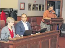  ?? ALISON JENKINS/ JOURNAL PIONEER ?? Dunsky consultant­s Julie-Ann Vincent, left, and Ahmed Hanafy listen while Greg Gaudet, director of municipal services answers a question from council Feb. 27.