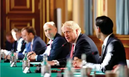  ?? Photograph: Simon Dawson/AFP/Getty Images ?? Boris Johnson at a cabinet meeting last month. ‘The rest of the world is not looking at Britain’s pandemic containmen­t strategy with envy.’