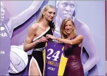  ?? SARAH STIER – GETTY IMAGES ?? Former Stanford star Cameron Brink poses with commission­er Cathy Engelbert after being selected by the Sparks in Monday's WNBA draft.