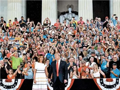  ?? MANDEL NGAN/GETTY-AFP ?? President Donald Trump and first lady Melania Trump arrive at the “Salute to America” celebratio­n at the Lincoln Memorial on Thursday.