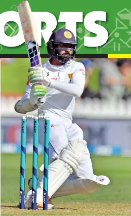  ??  ?? Wellington: Sri Lanka's Niroshan Dickwella plays a shot during day one of the first Test cricket match between New Zealand and Sri Lanka at the Basin Reserve in Wellington on December 15, 2018. / AFP