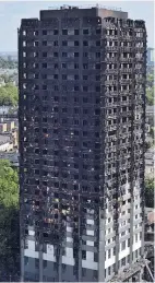  ??  ?? DEVASTATIO­N Grenfell Tower block