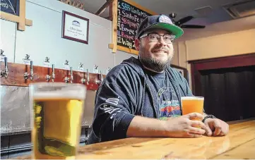  ?? ROBERTO E. ROSALES/JOURNAL ?? Jemez Mountain Brewhouse is now open in Jemez Springs and offering two original beers. Pictured is co-owner David Martinez behind the bar.