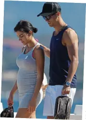  ?? Picture: GOFFPHOTOS.COM ?? Baby, maybe? With girlfriend Georgina Rodriguez, sporting a bump