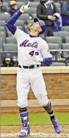  ?? Andrew Savulich/Daily News ?? Brandon Nimmo makes point with solo HR, triple and single, but cracking lineup is not easy for him.