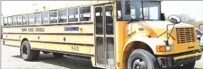  ?? Westside Eagle Observer/MIKE ECKELS ?? A Decatur Public Schools bus is parked at the entrance to Edmiston Baseball Park on April 2 in Decatur. The bus is equipped with WiFi for families with students in Decatur Schools that do not have access to the internet during the statewide school shutdown.