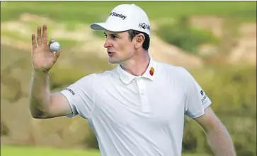  ?? Jeff Gross Getty Images ?? JUSTIN ROSE, reacting to a birdie on the 16th hole at Torrey Pines, also made two double bogeys Saturday.