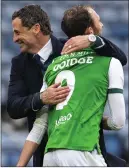  ??  ?? Jack Ross congratula­tes his goalscorer Christian Doidge