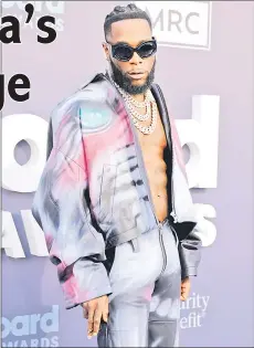  ?? — AFP file photo ?? Burna Boy attends the 2022 Billboard Music Awards at the MGM Grand Garden Arena in ias Vegas, Nevada.
