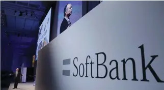  ??  ?? SoftBank Group CEO Masayoshi Son speaks during a presentati­on in Tokyo. (AP)