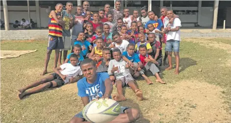  ?? Photo: Anasilini Natoga. ?? Bici Lewanavanu­a (with ball) and the Gau Kaji players at John Wesley Primary School in Raiwaqa on August 11, 2018.