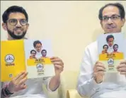  ??  ?? Shiv Sena chief Uddhav Thackeray (right) and his son and party candidate Aditya Thackeray in Mumbai on Saturday.
ANI