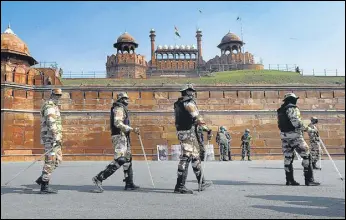  ?? PTI ?? Security personnel guard Red Fort a day after the monument was stormed by protesters.