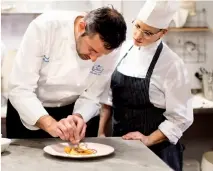  ??  ?? Clockwise from left: Grand Hotel Villa Serbelloni is set on a promontory extending into Lake Como; Michelinst­arred Chef Ettore Bocchia with local fishermen; pastry chef Manuel Ferrari is a dessert wizard.