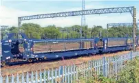  ?? SF LAPPAGE ?? Refurbishe­d GroupeCat IPA car transporte­r No. 23 87 4392 690-5 at Bescot Yard on August 12.