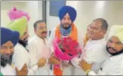  ?? HT PHOTO ?? Punjab Congress president Navjot Singh Sidhu being welcomed at the party office in Chandigarh on Monday.